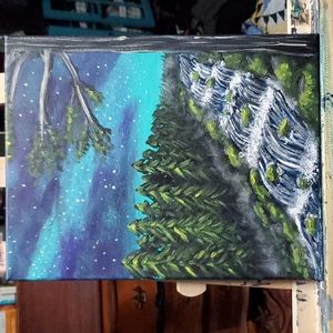 Forest waterfall at night